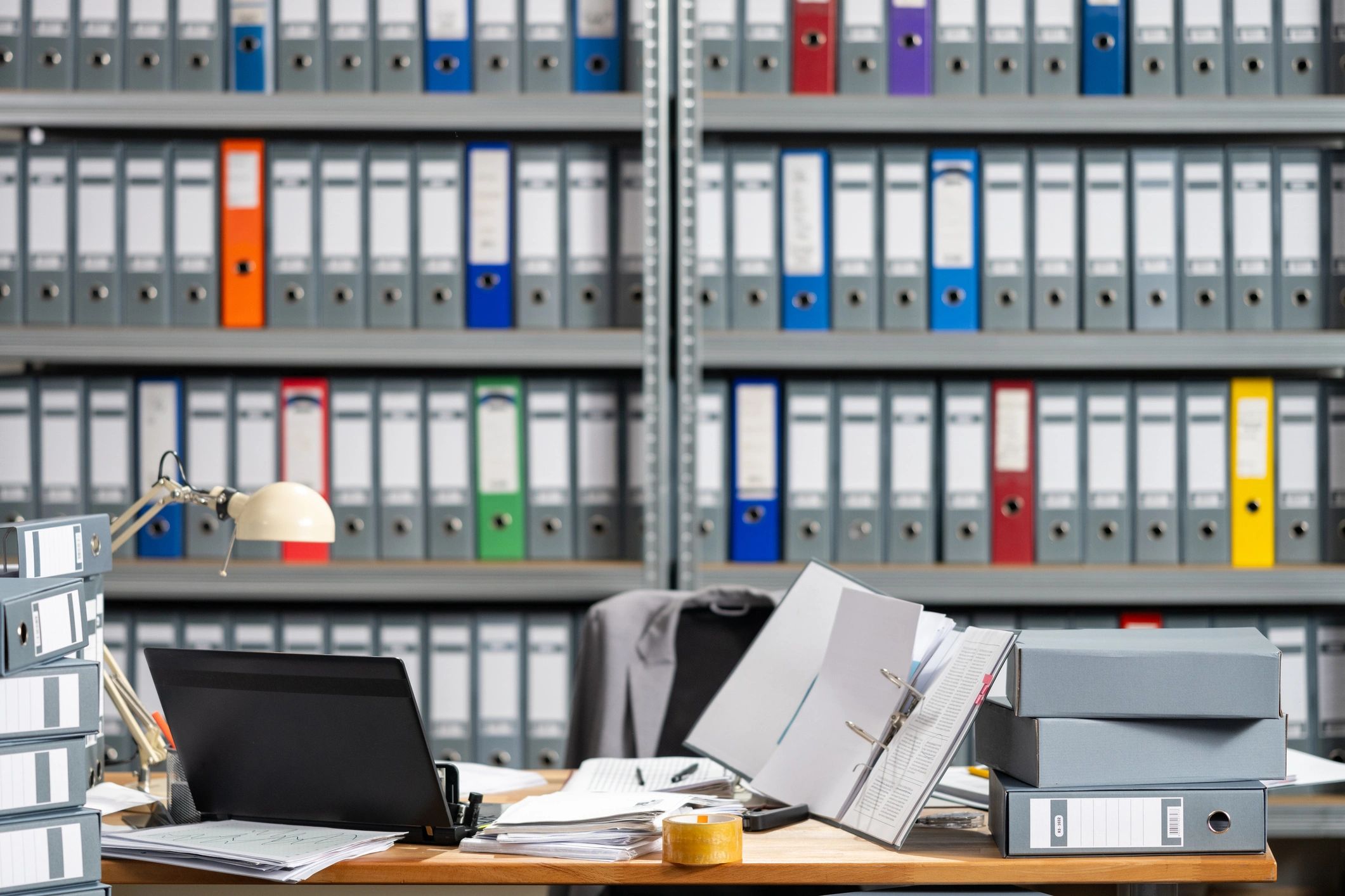 Workspace with files and binders on a table